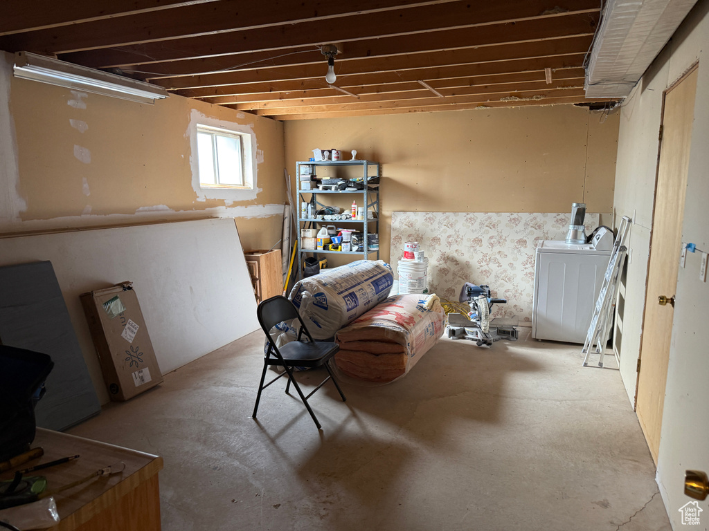 Basement with washer / clothes dryer
