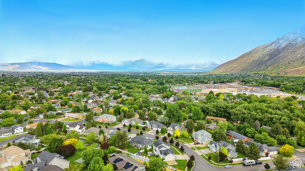 Aerial perspective of suburban area featuring mountains