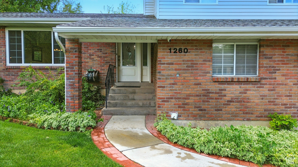 Property entrance with brick siding
