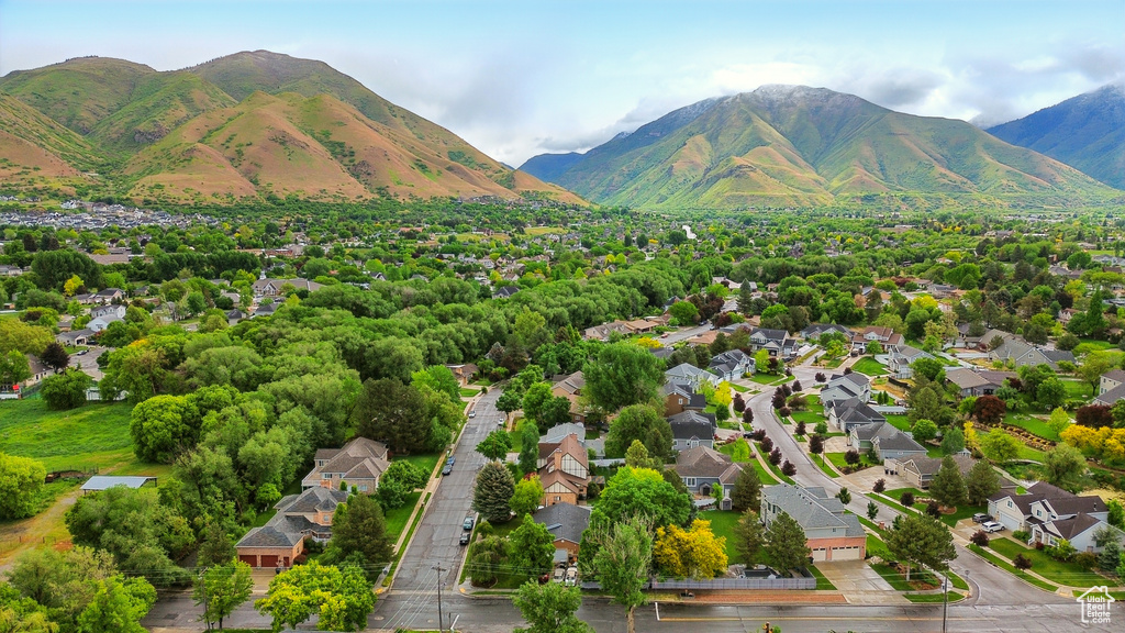 View of mountain backdrop with nearby suburban area