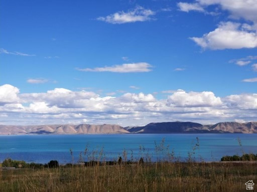 Water view featuring mountains