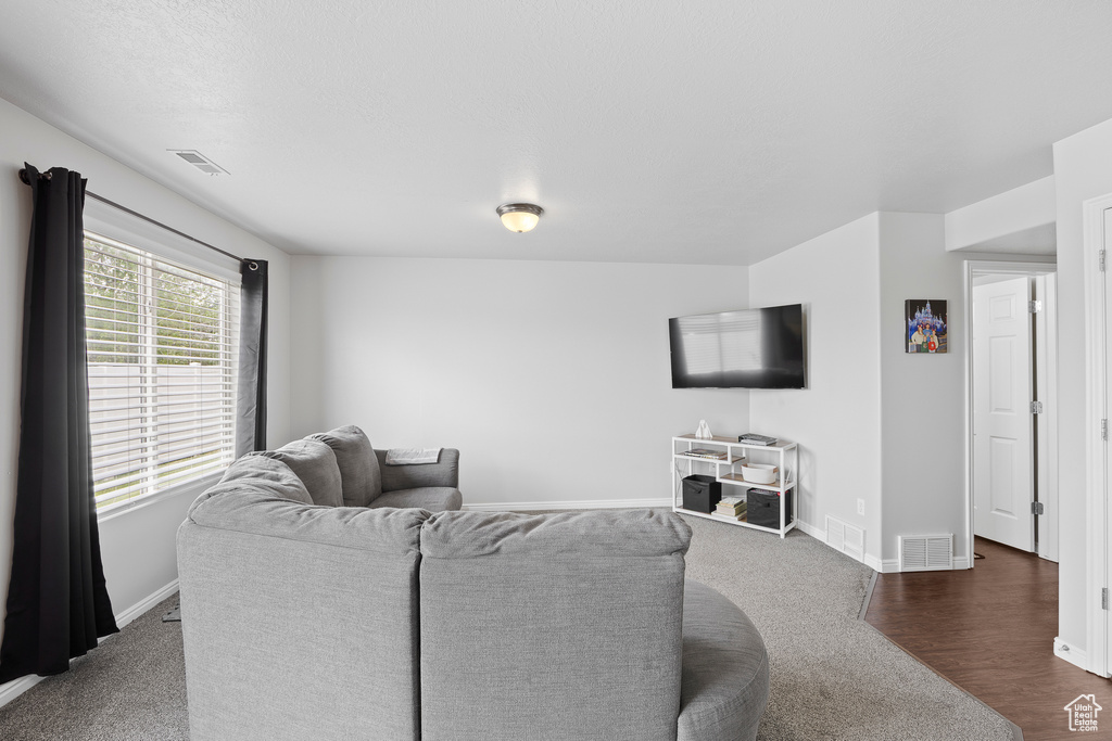 Living area featuring baseboards