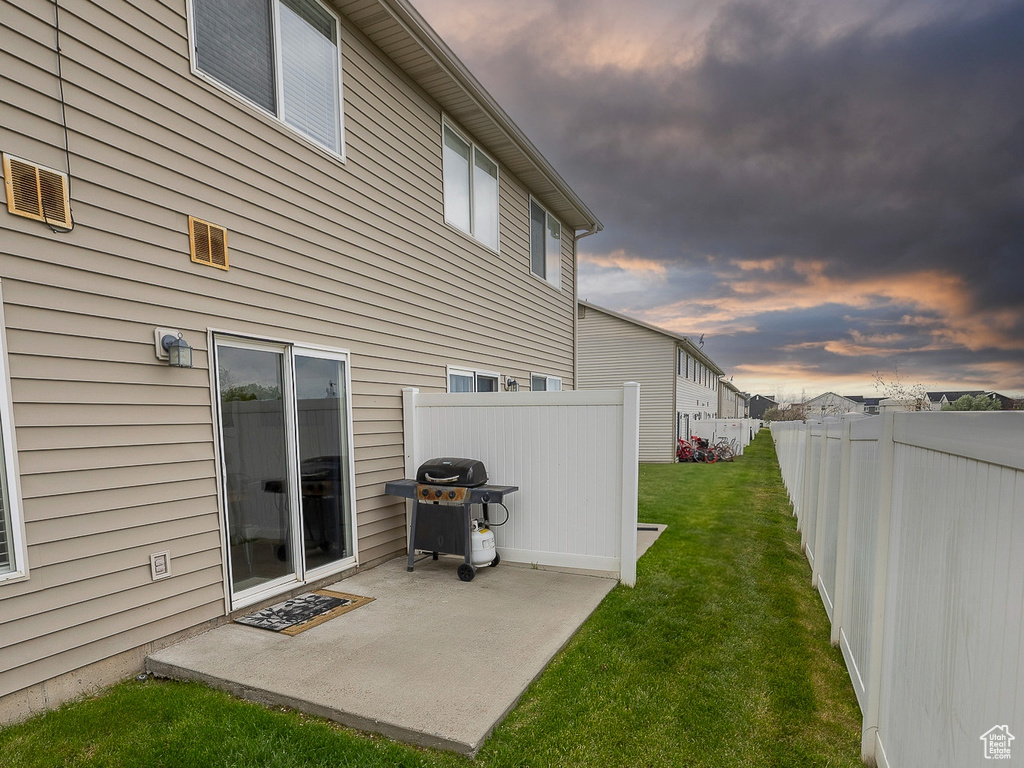 Rear view of house with a patio area