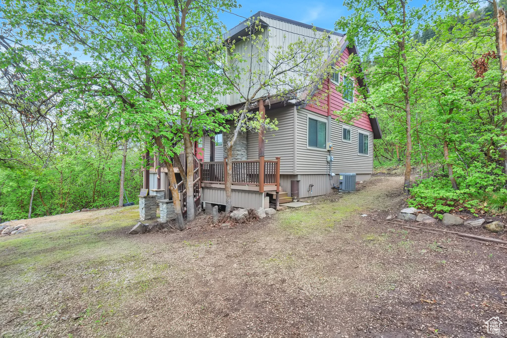 View of home\\\'s exterior with cooling unit