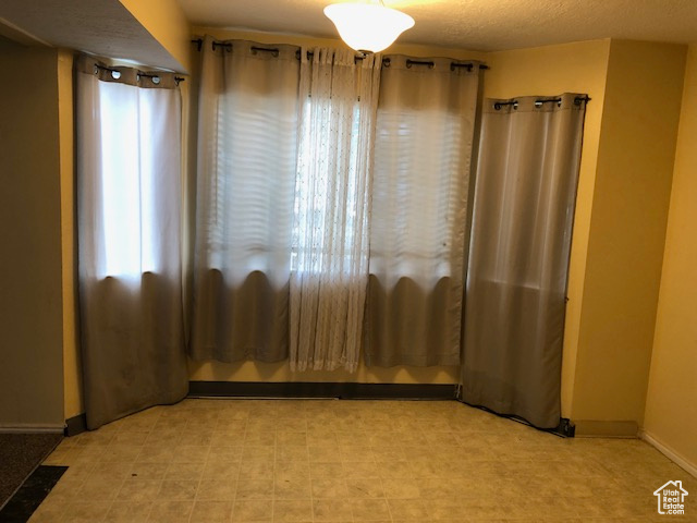 Empty room with baseboards