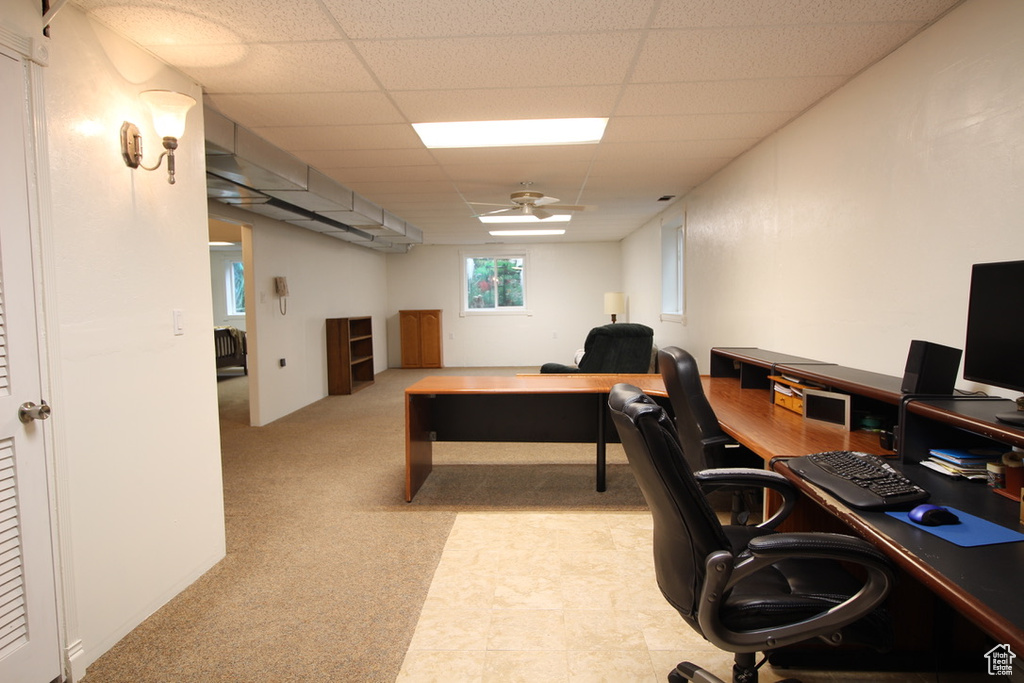 Office space featuring a paneled ceiling