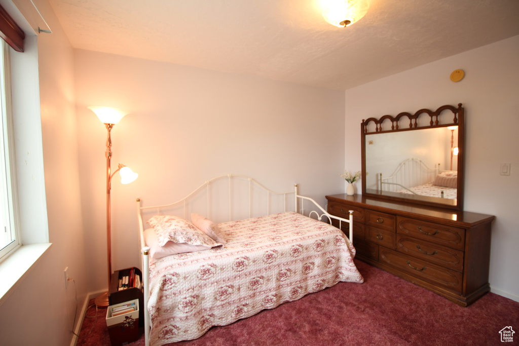 Bedroom featuring carpet floors