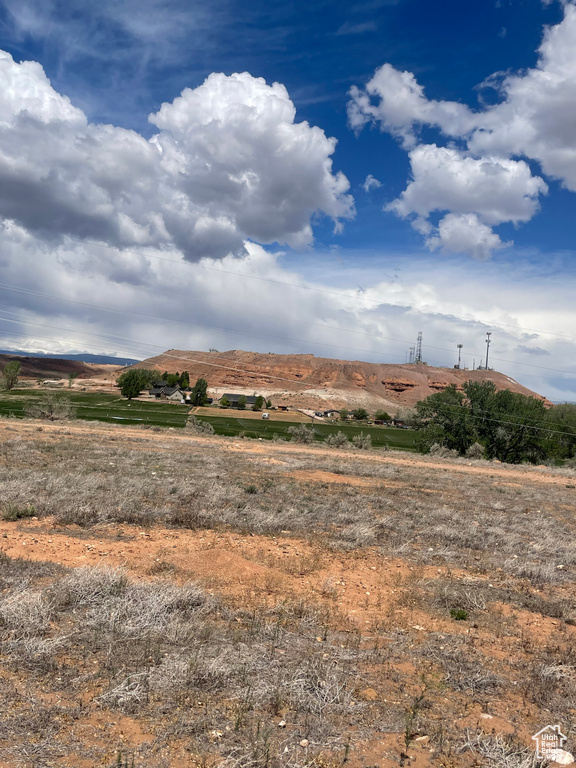 View of mountain backdrop featuring rural landscape