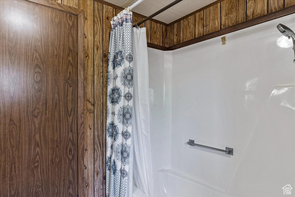 Bathroom featuring a shower with shower curtain