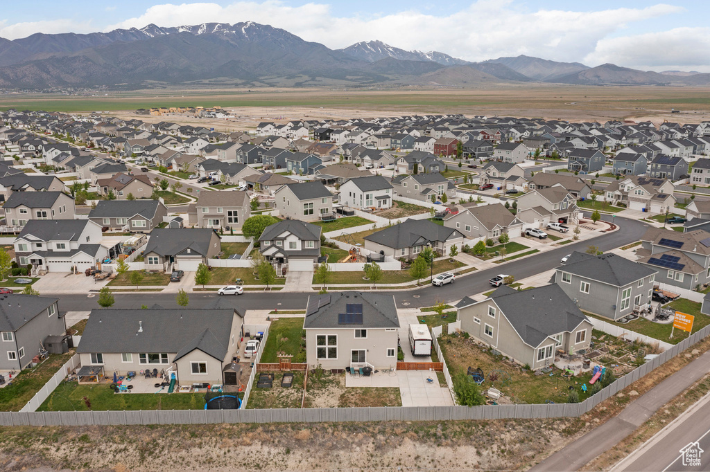 Aerial view of residential area with a mountain backdrop