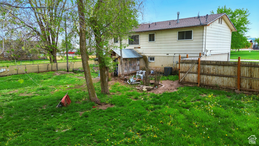 Back of property with cooling unit