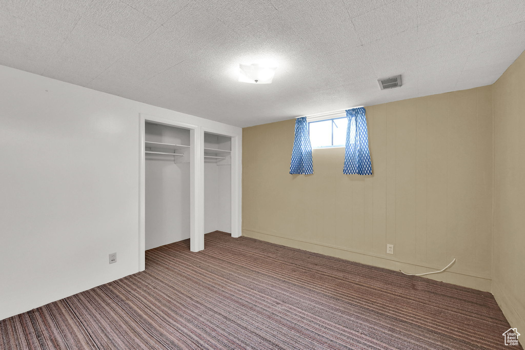 Unfurnished bedroom featuring carpet flooring