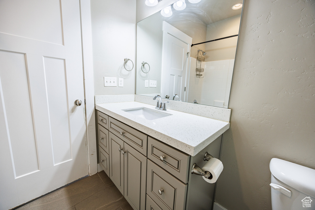 Bathroom with toilet and vanity
