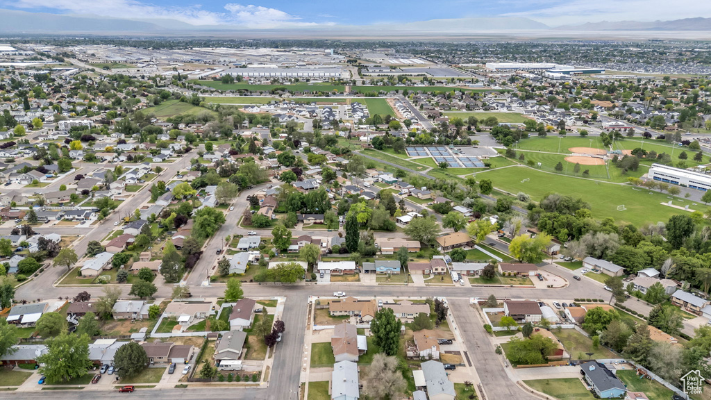 Aerial view of property\'s location featuring nearby suburban area