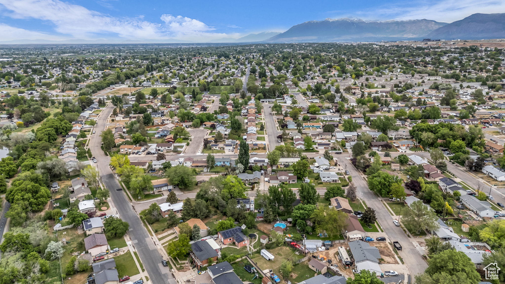 View of property location with a mountainous background and nearby suburban area
