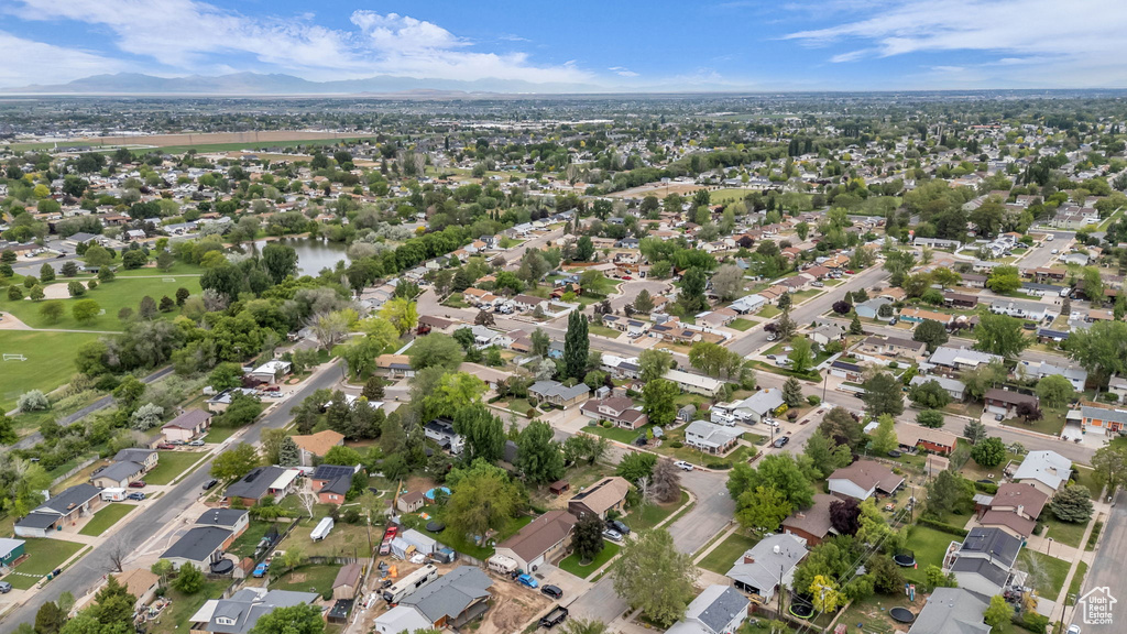 Aerial view of property\'s location featuring nearby suburban area