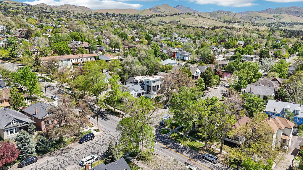 Aerial view of residential area featuring a mountain backdrop