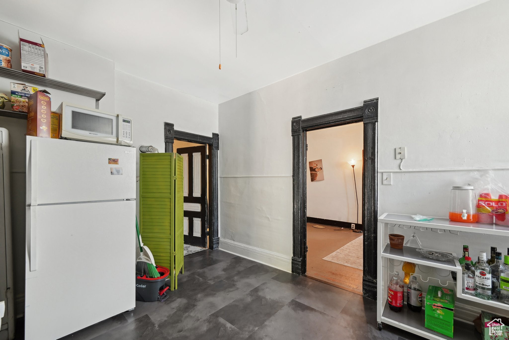 Kitchen featuring white appliances