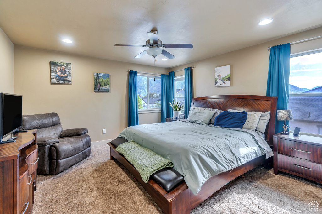 Bedroom with carpet flooring, recessed lighting, baseboards, and a ceiling fan