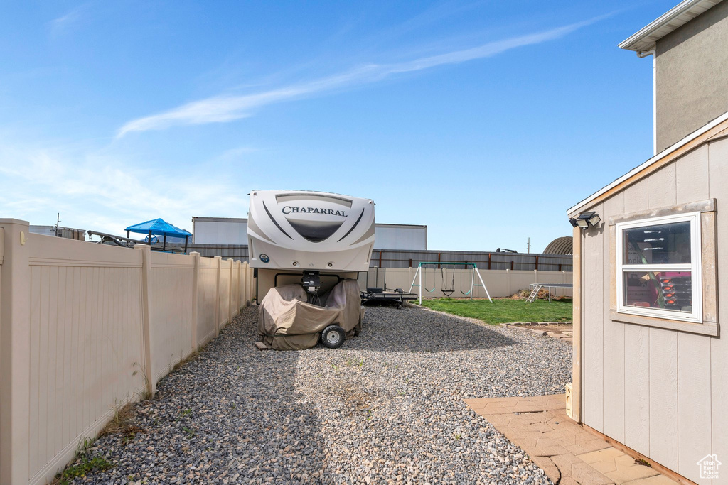 View of fenced backyard