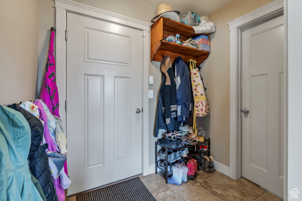 Mudroom featuring baseboards