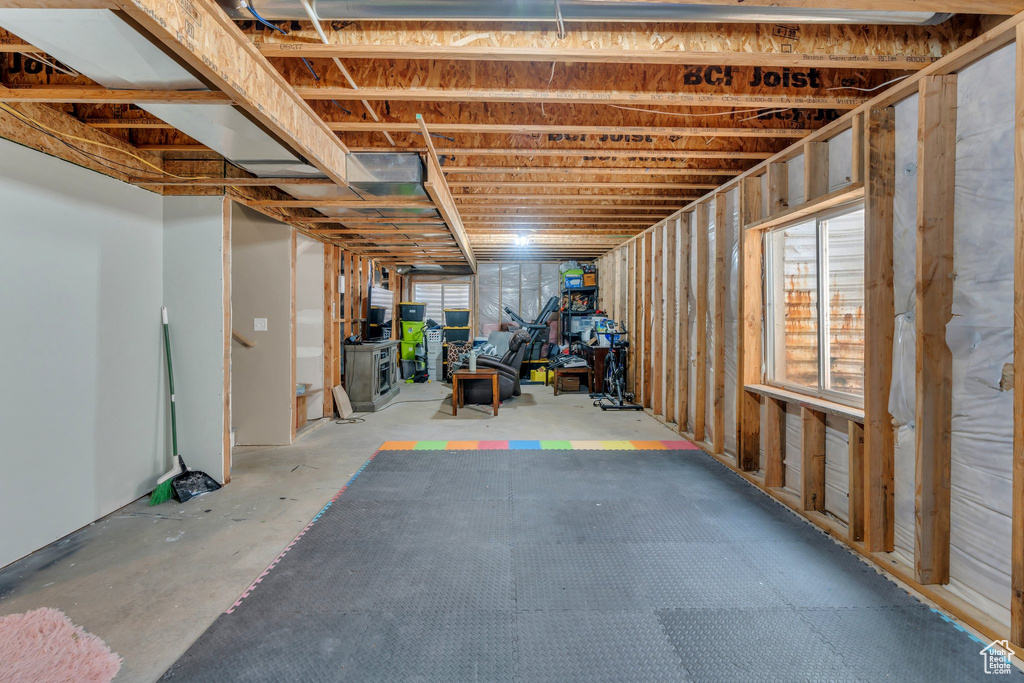 Basement featuring plenty of natural light
