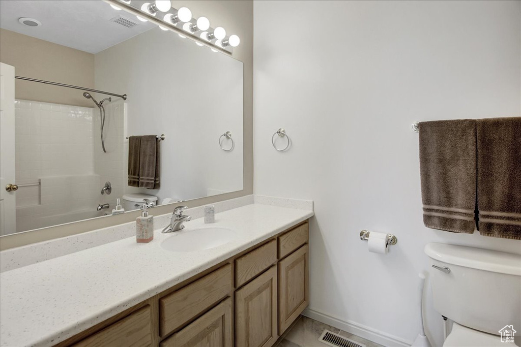 Bathroom featuring toilet and vanity