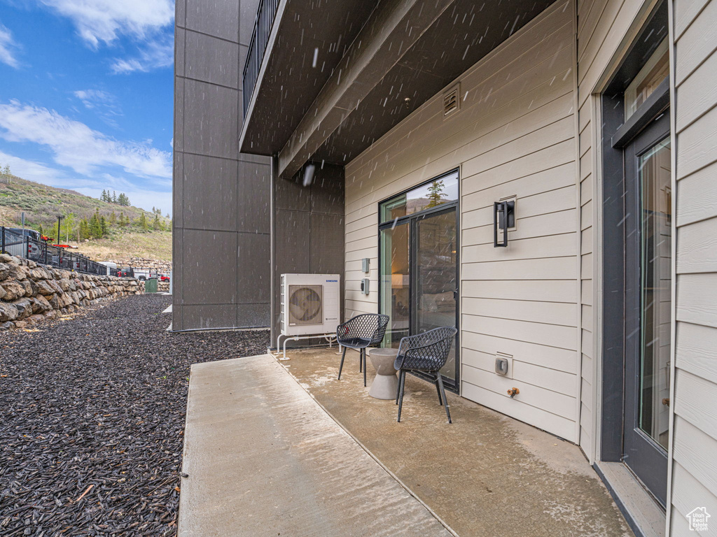 View of patio featuring a mountain view