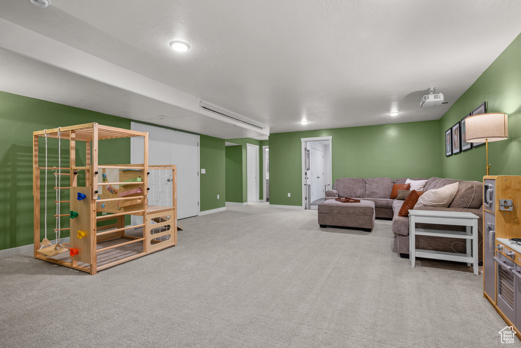 Living room featuring carpet floors and baseboards