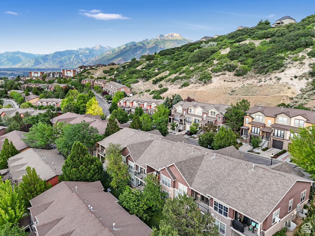 Aerial view of residential area featuring mountains