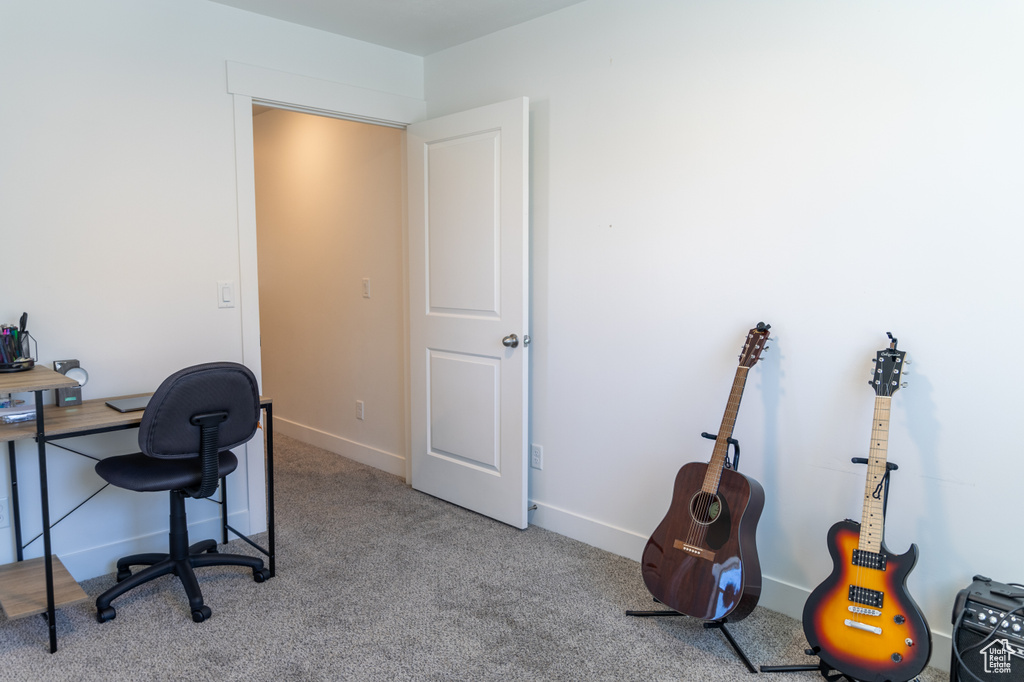 Office featuring carpet and baseboards