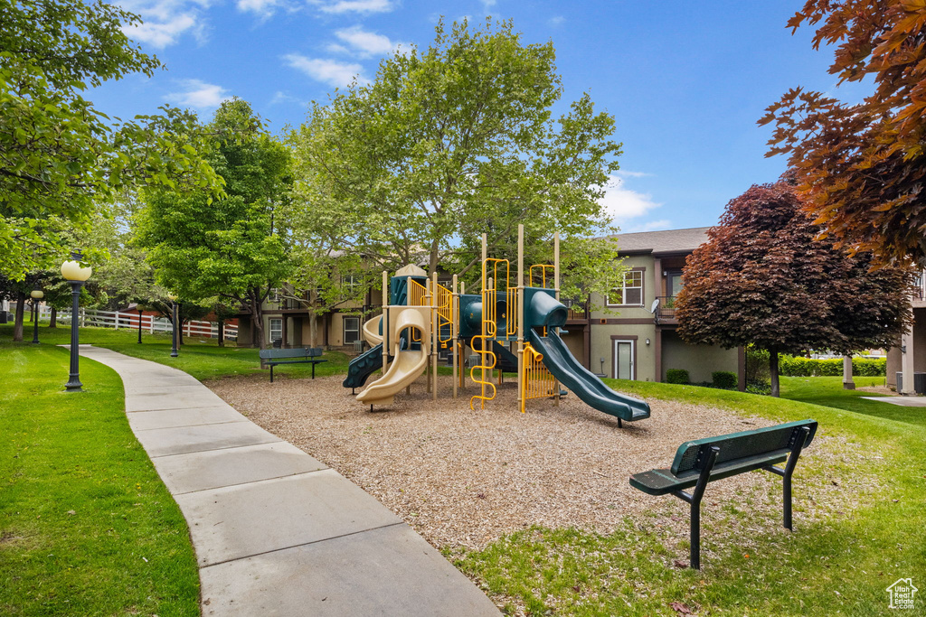 Communal playground featuring a yard
