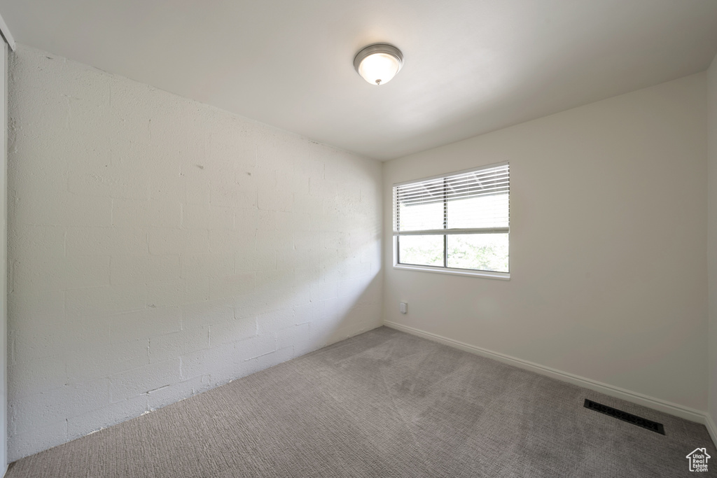 Spare room with carpet floors