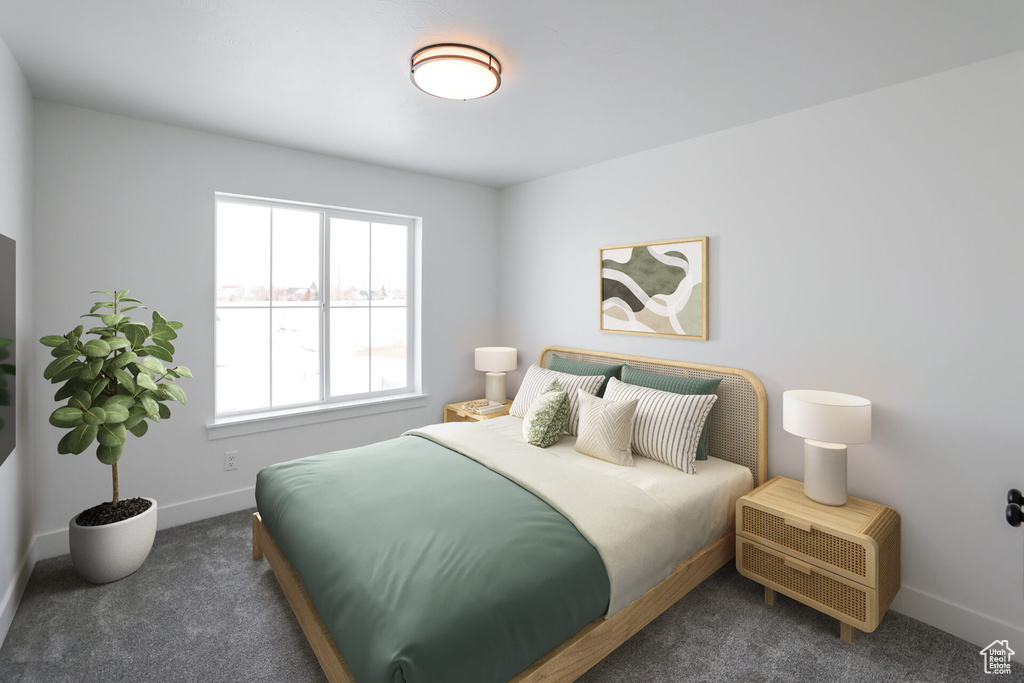 Carpeted bedroom with baseboards