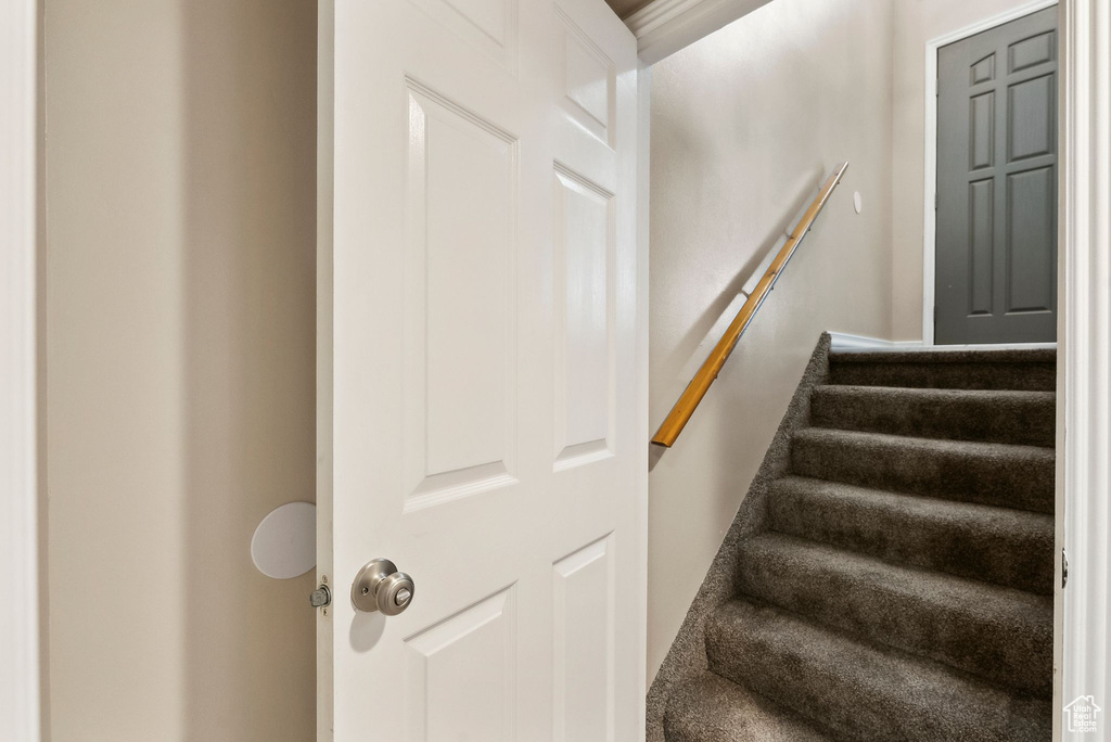 Stairway featuring baseboards