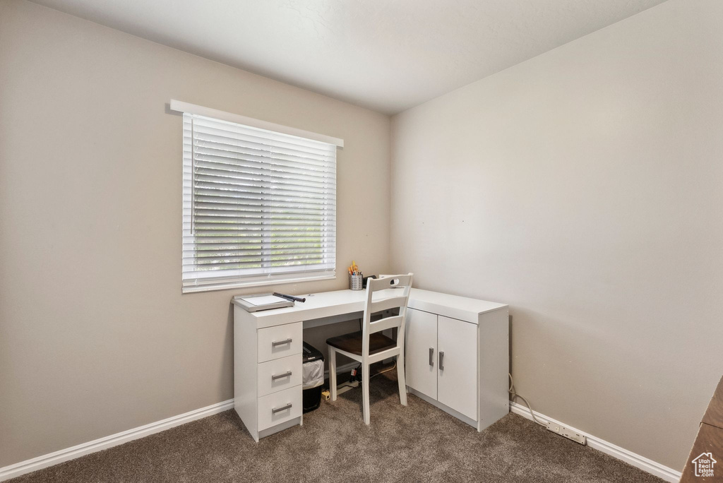 Office featuring carpet and baseboards