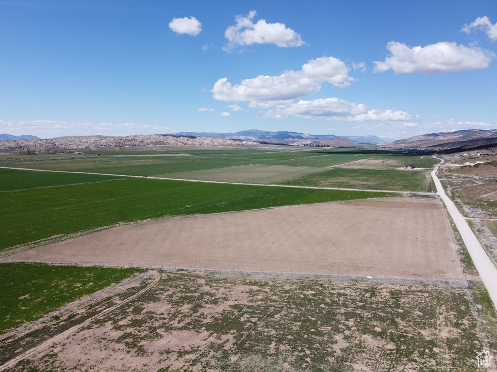 View of community featuring a rural view and a mountain view
