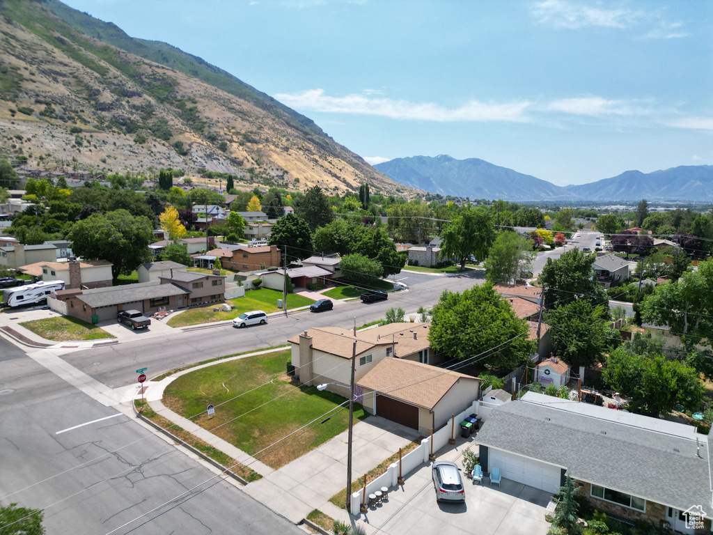 View of mountain background featuring nearby suburban area