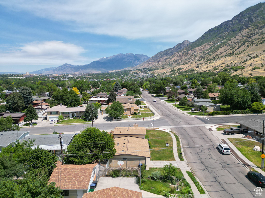 Aerial view of residential area with a mountain backdrop