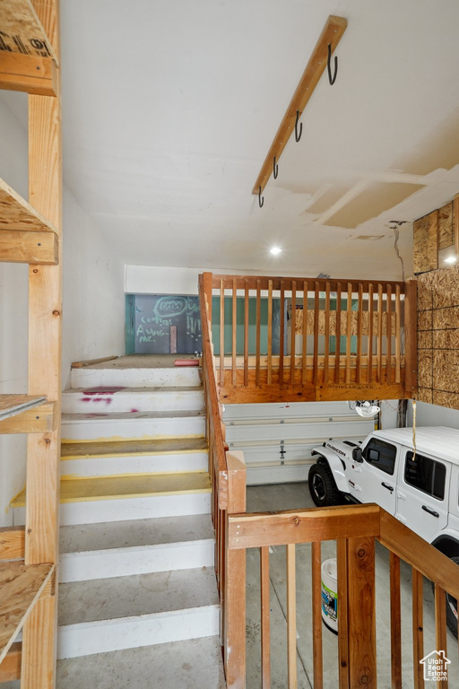 Stairway with concrete flooring