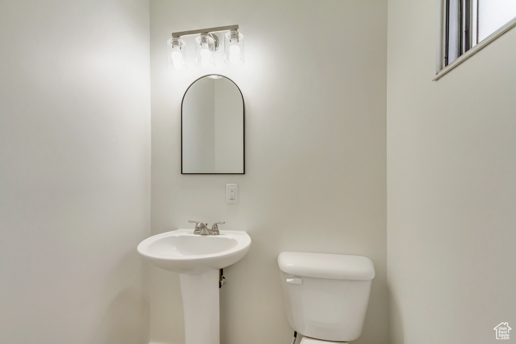 Bathroom with toilet and a sink