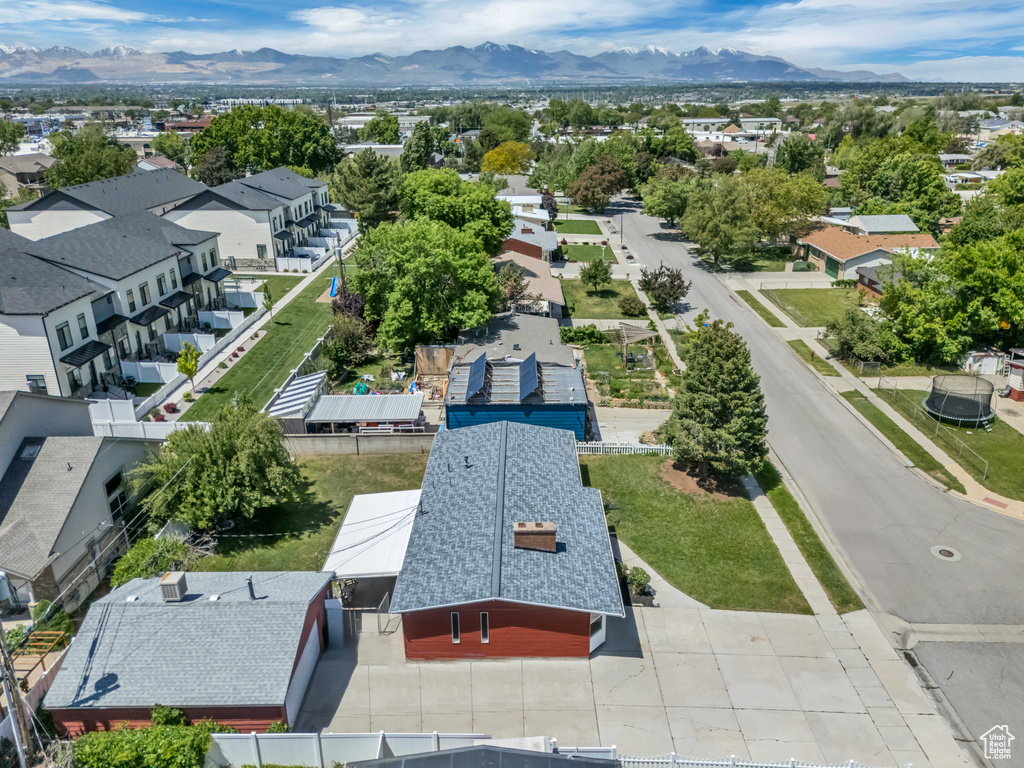 Aerial view of residential area with a mountain backdrop