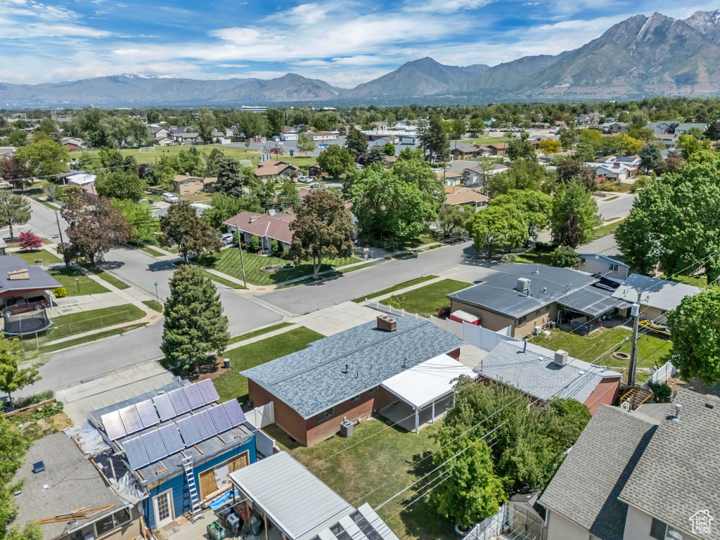 Aerial view of residential area featuring mountains