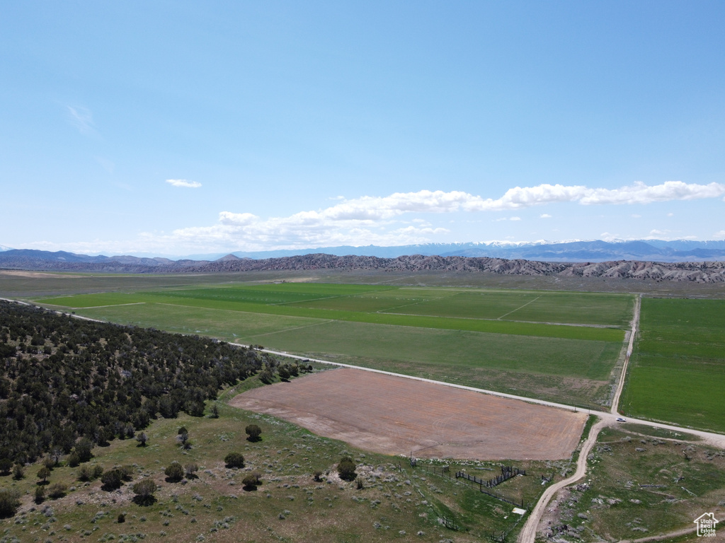 Aerial view of sparsely populated area featuring a mountainous background
