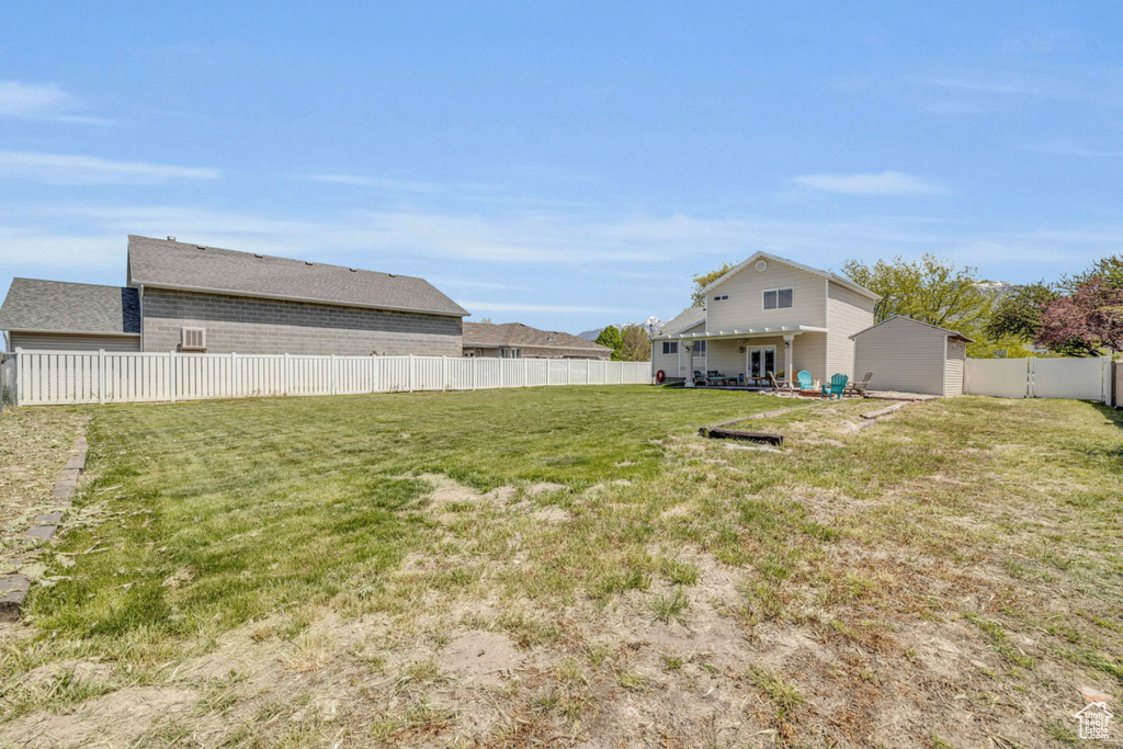 View of yard with a patio area