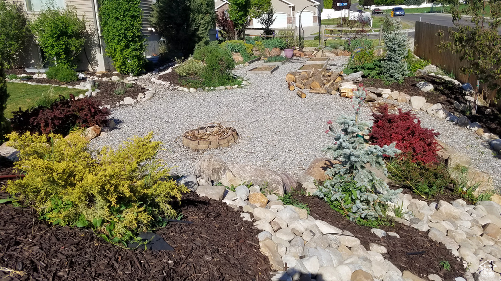 View of yard featuring fence