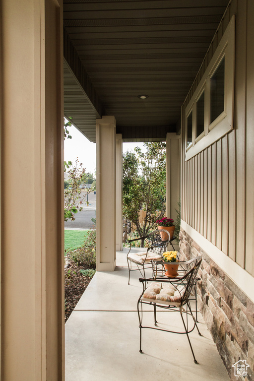 View of patio featuring covered porch