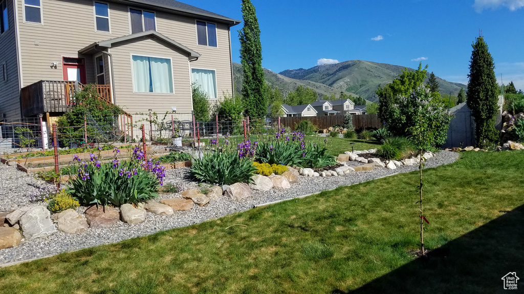 View of yard with a mountain view
