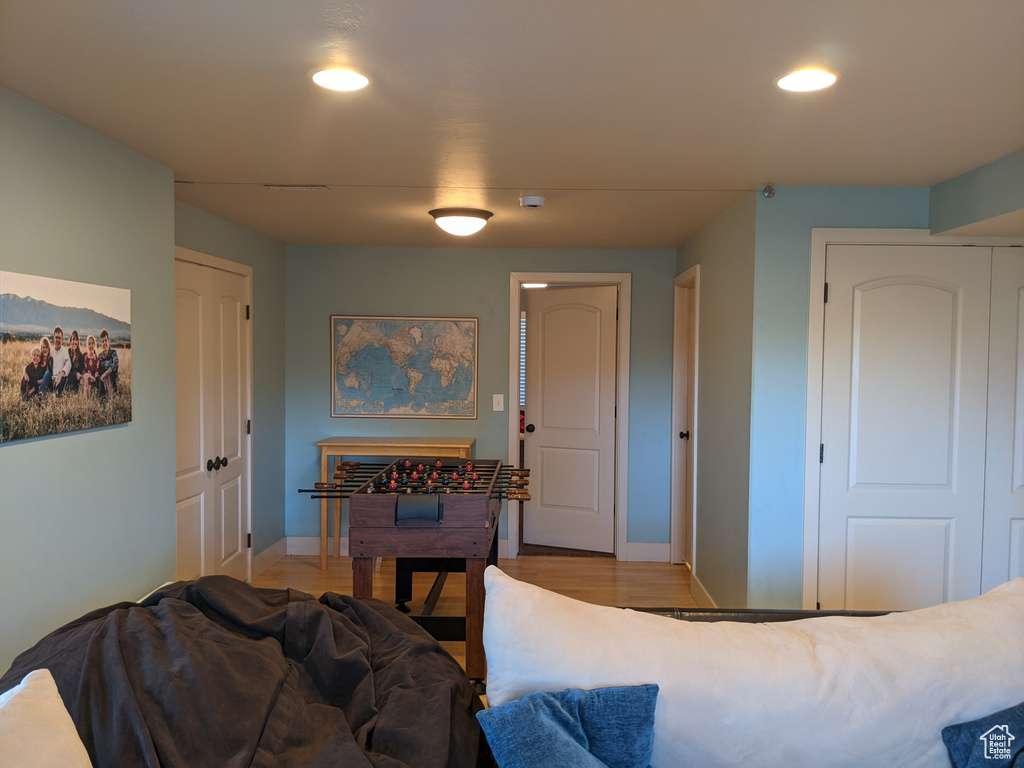 Living room featuring recessed lighting, baseboards, and wood finished floors