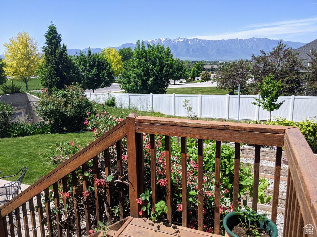 Wooden deck featuring a mountain view